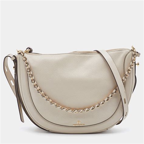 michael michael kors jagger leather messenger bag|Michael Kors studded crossbody bag.